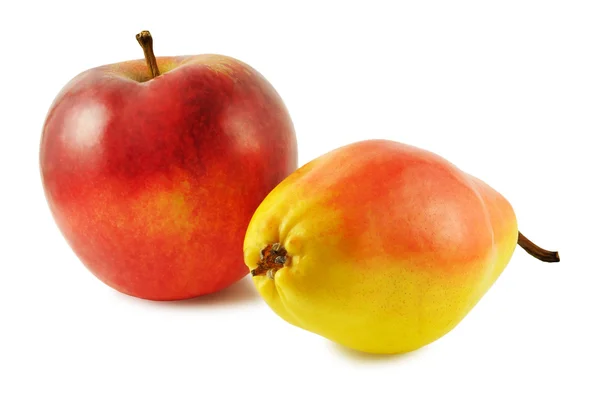 Žlutá hruška a červené jablko — Stock fotografie