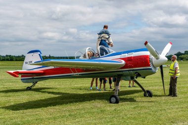 Breclav, Czech Republic - July 02, 2022 Aviation Day. Sports aerobatic aircraft Yak 55 ready at the airport