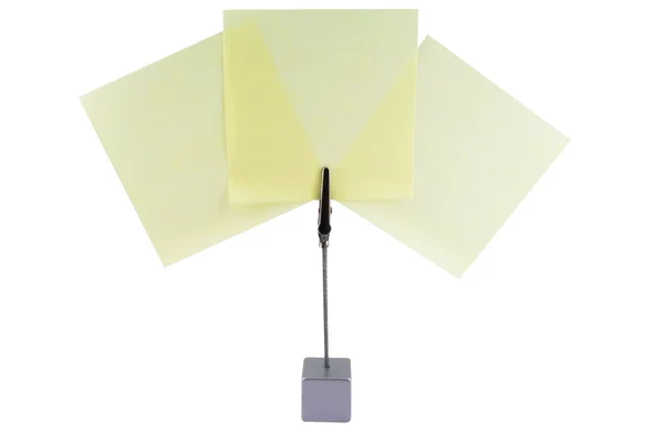 Klemme, die drei Post-it 's hält — Stockfoto