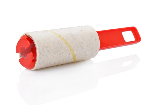Used adhesive roller used to clean the clothing from animal fur and hair — Stock Photo, Image