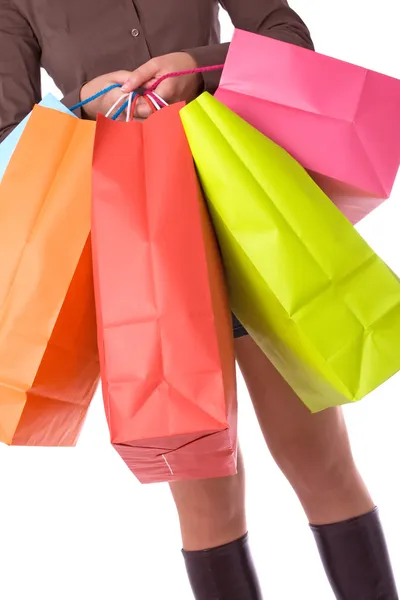 Young attractive woman carrying several shopping bags — Stock Photo, Image