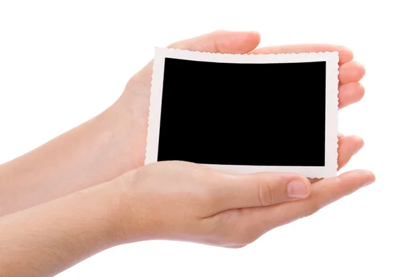 Hands holding a photograph isolated on a white background — Stock Photo, Image