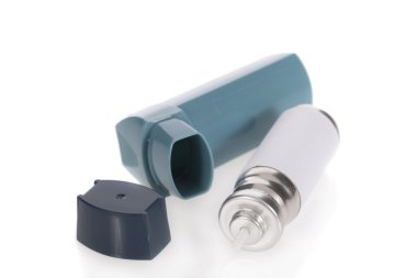 Asthma inhaler isolated on a white background clipart