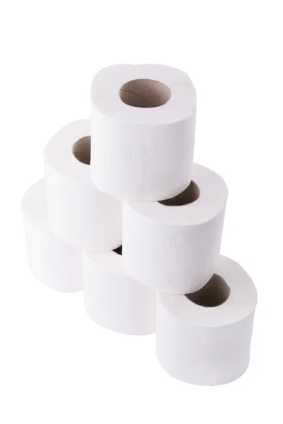 Tuvalet kağıdı yığını üzerinde izole beyaz arka plan rulo — Stok fotoğraf