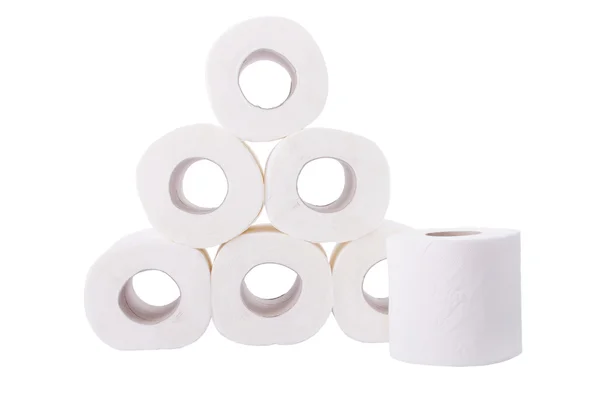 Куча рулонов туалетной бумаги на белом фоне — стоковое фото