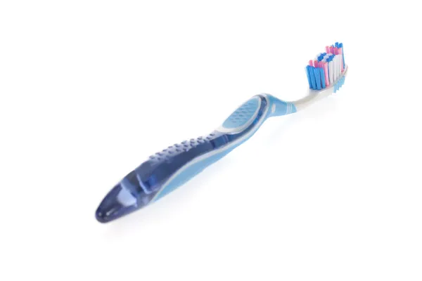 Moderne tandenborstel geïsoleerd op een witte achtergrond — Stockfoto