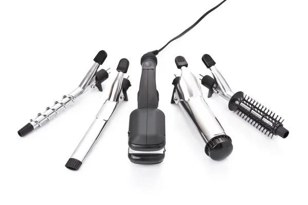 Hair styling set with straightener and curling accessories — Stock Photo, Image