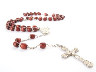 Rosary isolated over white background clipart