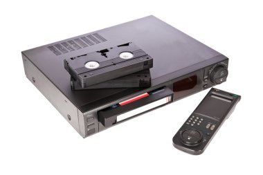 Old Video Cassette Recorder and tapes isolated on white background clipart