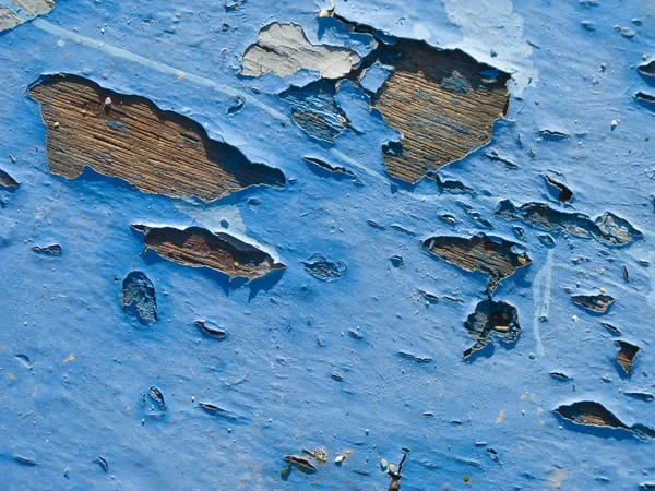 Tinta descascada sobre tábuas de madeira de um casco de barco — Fotografia de Stock