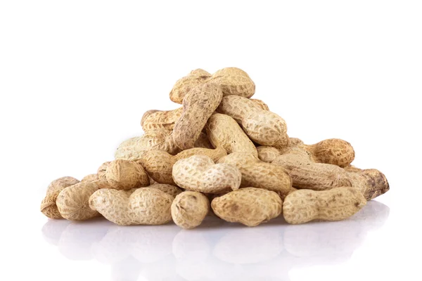 Peanuts pile isolated on a white background — Stock Photo, Image