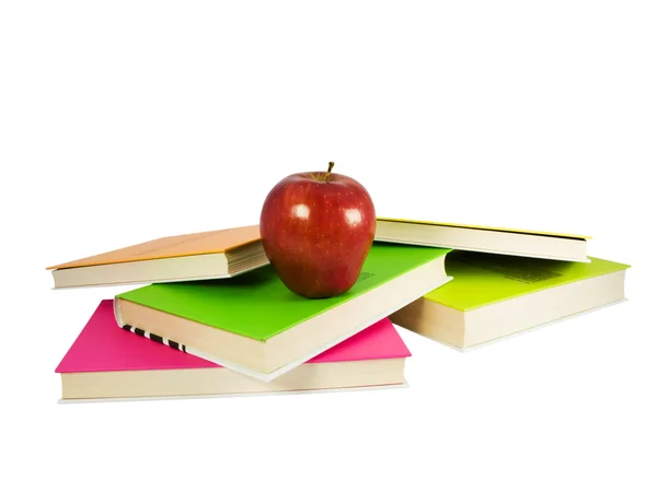 Apple in top of books stack — Stock Photo, Image