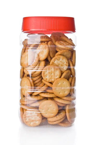 Frasco de pequenos biscoitos aperitivos isolados em branco — Fotografia de Stock
