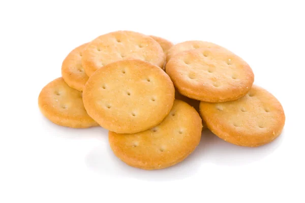 Pequenos biscoitos aperitivos isolados no fundo branco — Fotografia de Stock