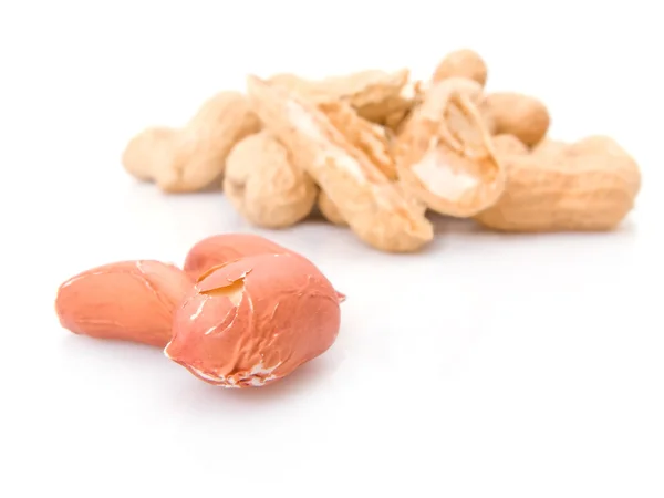 Peeled peanuts pile isolated on white background — Stock Photo, Image