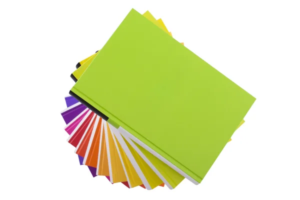 Mucchio di libri colorati isolati su bianco — Foto Stock