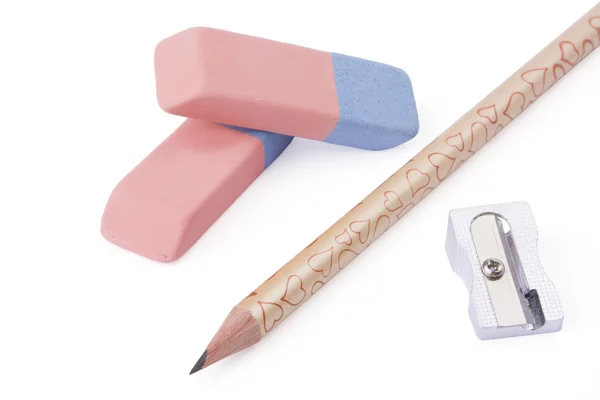 Crayon, taille-crayon et gomme sur fond blanc — Photo