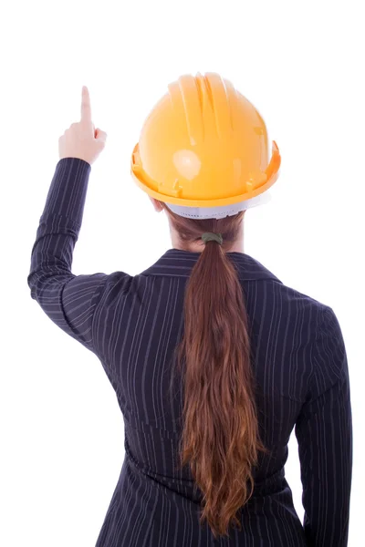 Mujer joven en un concepto de construcción aislado en blanco . — Foto de Stock