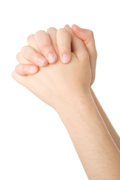 Mãos fechadas em oração isoladas sobre fundo branco — Fotografia de Stock