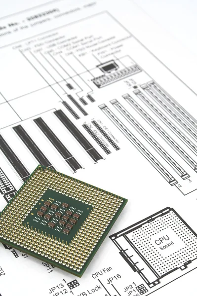 Motherboard instruction manual with diagram and cpu close-up — Stock Photo, Image