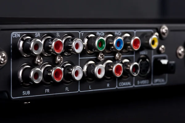 Close up of the plugs for the 5.1 surround sound system in a DVD player — Stock Photo, Image