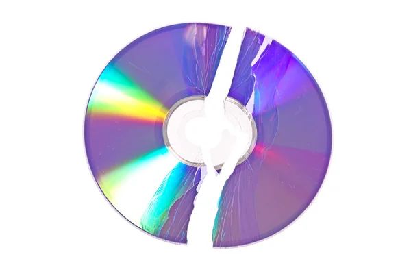 DVD / CD quebrado isolado em um fundo branco — Fotografia de Stock