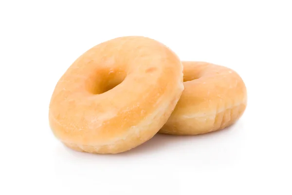 Dwa pączki lub donuts ułożone na białym tle na biały Zdjęcia Stockowe bez tantiem