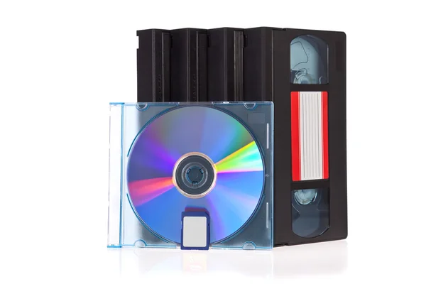 Old Video Cassette tape, with a DVD disc and Flash Memory Card isolated on white background — Stock Photo, Image