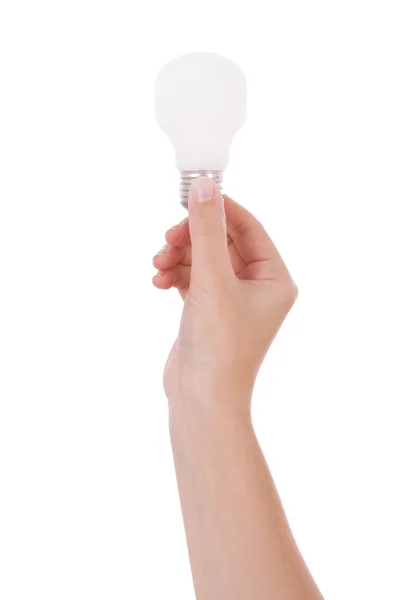 Hand holding an incandescent light bulb isolated on white — Stock Photo, Image