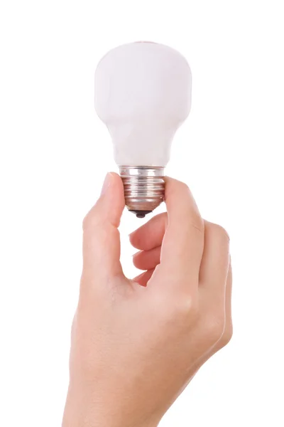 Hand holding an incandescent light bulb isolated on white — Stock Photo, Image