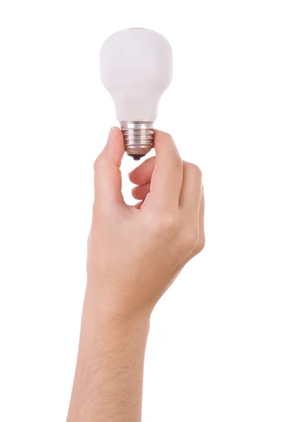 Hand holding an incandescent light bulb isolated on white — Stock Photo, Image