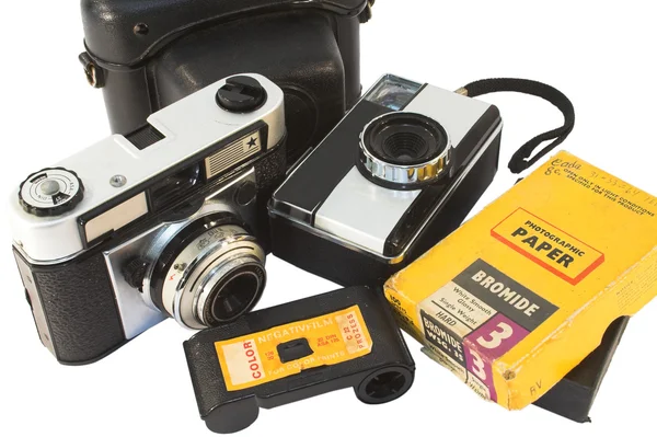Old, vintage film cameras with photo paper, negative roll and case — Stock Photo, Image