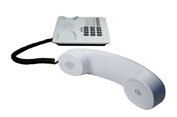 Telefone de escritório com cordão sinuoso isolado em branco . — Fotografia de Stock