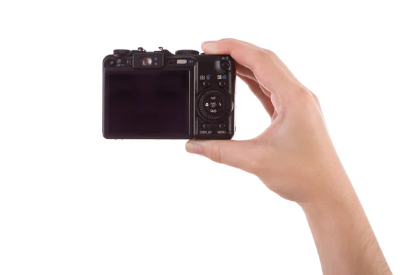 Hand photographing with a digital camera isolated on white — Stock Photo, Image