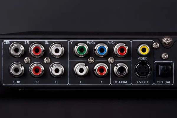 Close up of the plugs for the 5.1 surround sound system in a DVD player — Stock Photo, Image