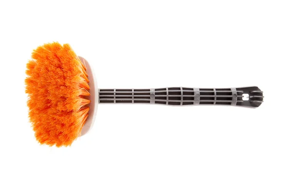 Paintbrush or small broom used for whitewashing walls or sweeping on white — Stock Photo, Image