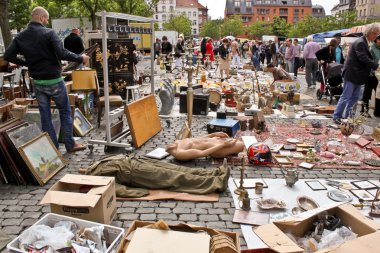Brussels, Belgium - May 22 - choose things on a flea mark