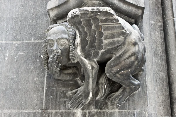 A figure of sphinx as a decor element of the New Town Hall, Muni — Stock Photo, Image