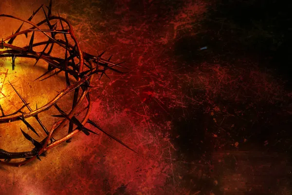 Crown of thorns on dark red grunge background — Stock Photo, Image