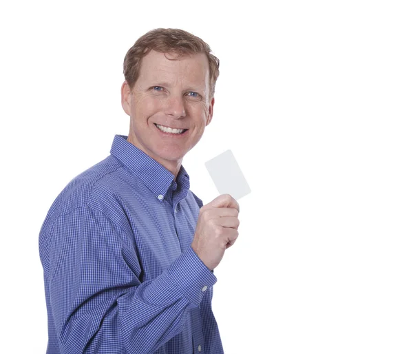 Casual businessman isolated on white displaying a card — Stock Photo, Image