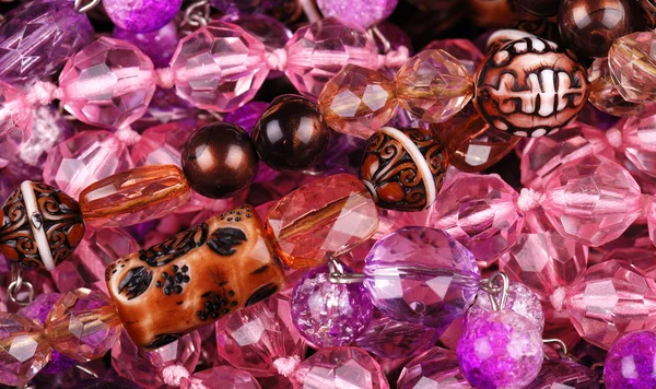 Фон из различных розовых ювелирных изделий — стоковое фото