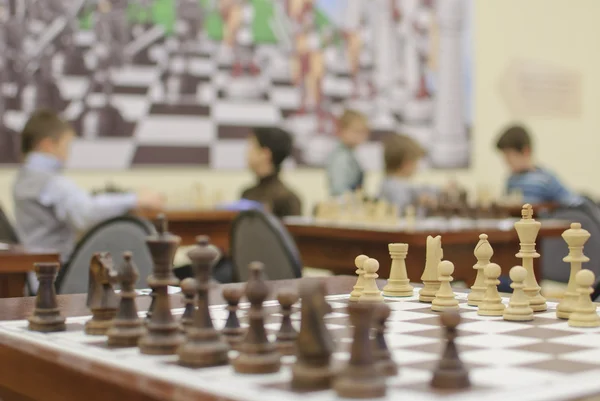 Wooden chess pieces — Stock Photo, Image