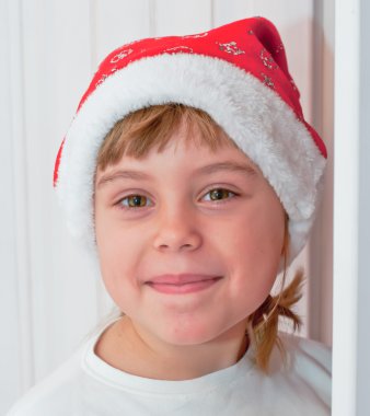 Noel Baba şapkası mutlu küçük kız
