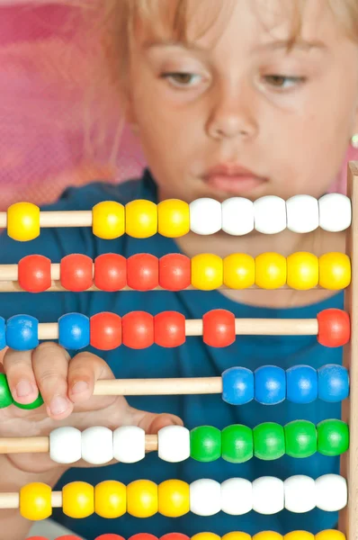 Little Girl with abacus — Stock Photo, Image