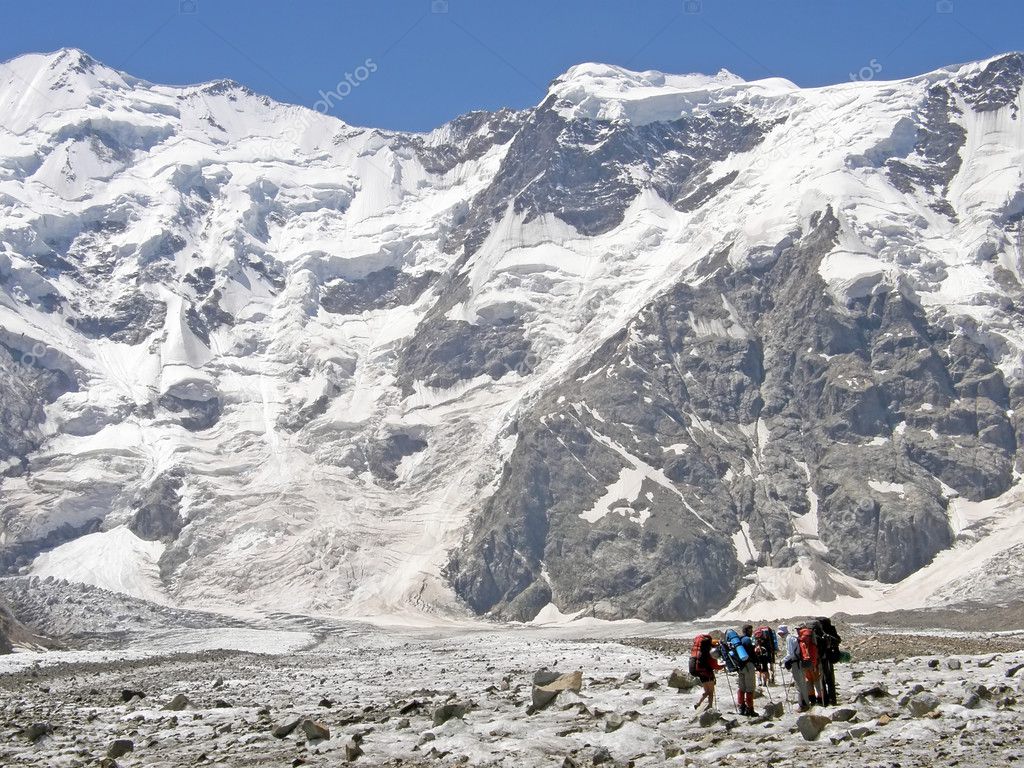 A group of alpinists is in the mountains of Caucasus