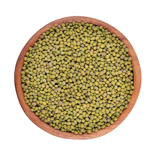 Green mung beans in a wooden bowl on a white background — Stock Photo, Image