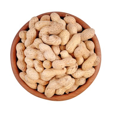 beyaz zemin üzerinde bir ahşap kase fıstık