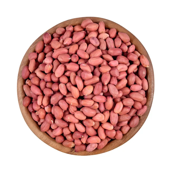 Peeled peanuts in a wooden bowl on a white background — Stock Photo, Image