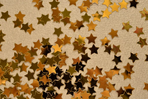 Конфітті у вигляді золотих зірок — стокове фото
