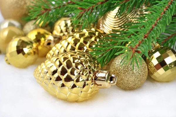 Gold bump and Christmas decorations — Stock Photo, Image